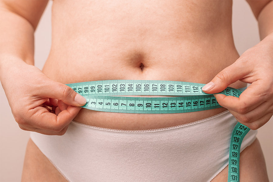6 Tricks to Eliminate Your Bloated Belly - Tackling Our Debt
