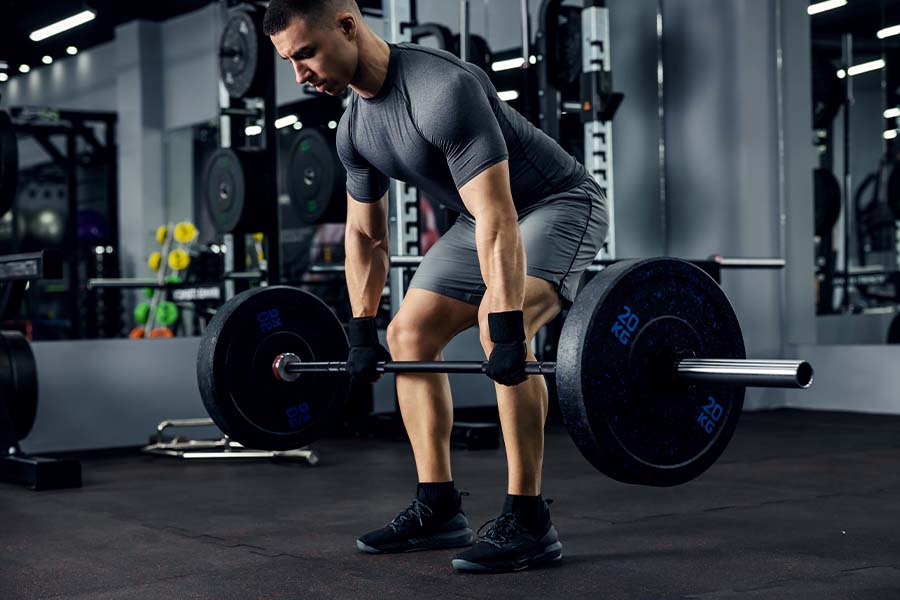 A Full-Body Barbell Workout for Beginners That Can Build Your Gym Confidence