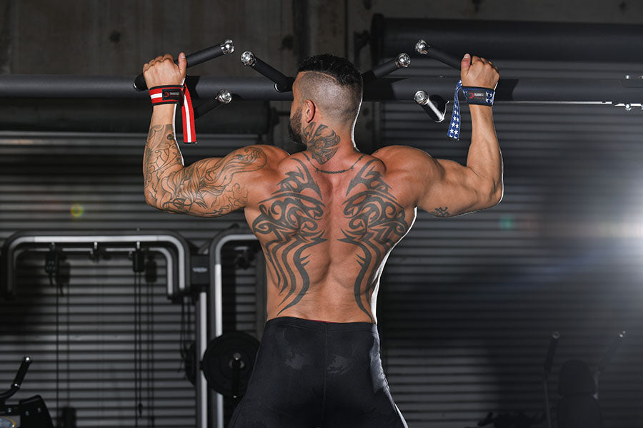 The Lat Pulldown Vs. The Pull-Up — Which One is Best for Back Gains?