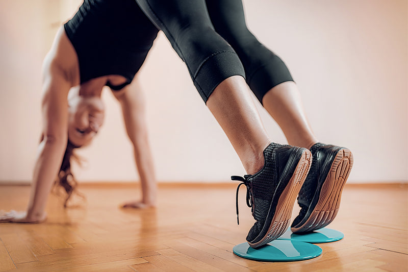 20-Minute Dumbbell & Exercise Slider Workout to Strengthen Your Entire Body